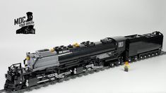 a lego train is shown in front of a white background with the words moc on it