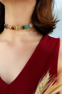 The multicolored choker is flawlessly handcrafted with carved acrylic stones by the artisans of India to celebrate beauty with the heritage of rich old Indian Jewelry. The western necklace is made on 22K gold plating and has multicolor stones to give you color therapy. Add this gold choker to your style and make your mark in all your festive or contemporary ensembles. Necklace Closure - Lobster Style Tip - This design is a perfect intersection of bohemian and traditional, put together thoughtful Sabyasachi Jewelry, Western Necklace, Choker Necklace Designs, Sabyasachi Jewellery, Fancy Jewelry Necklace, Western Necklaces, Stone Choker, Fancy Jewellery, Jewelry Lookbook