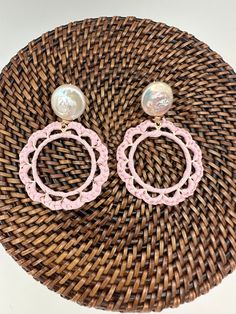 These light, raffia-wrapped earrings are the perfect accessory to add a pop of color and go well with layered necklaces. Measuring 1.5", they are light and easy to wear.