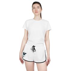 With a casual style and a relaxed fit for those easy-going days, these women's shorts are a highly versatile staple meant to be enjoyed on a daily basis. With a drawstring and edge-trim in black or white color, these shorts provide extra style points and custom comfort. Made with top-tier polyester material through and through, these shorts remain comfy throughout the entire day.  .: Material: 100% polyester .: Medium fabric (7.76 oz/yd²(263 g/m .: Relaxed fit .: Drawstring and edge trim in black or white color .: Curved bottom hem Women Shorts, Shorts For Women, Easy Going, Skorts, Butterfly Design, Top Tier, Polyester Material, Short Outfits, Women's Shorts