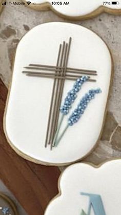 decorated cookies with crosses and lavenders on them