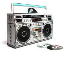 an old fashioned boombox with cd's on the side and two discs in front