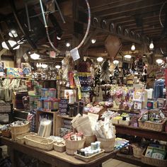 a store filled with lots of items and lights