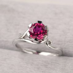 ◆ The ring is handcrafted from sterling silver and decorated with a dazzling 7*7 mm ruby. It is suitable for engagement/anniversary/daily occasion. ◆ Production Description: Main stone Type: Lab Ruby Main Stone Shape: Round Cut Main Stone Size: 7*7 mm(1.66ct) Side stone: None Metal: 925 Sterling silver - Other options available in the drop down menu ◆ Customization: √Free for Add Engraving √Other Metal Type Available √Other Gemstones & Shapes Available √Personalization Requests Available ◆ Packa Rubin Ring, July Birthstone Ring, July Birthstone, Engagement Anniversary, Ruby Ring, Beautiful Gift Boxes, Ring Sterling Silver, Birthstone Ring, Sterling Ring