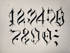 some type of writing that is black and white with letters in the upper right corner