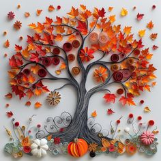 a tree made out of paper with lots of fall leaves and pumpkins on it