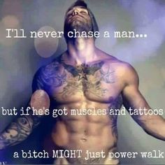 a man with tattoos on his chest and arms