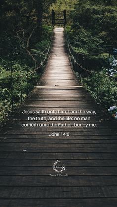 a wooden bridge in the woods with a bible verse about jesus unto him, i am the way