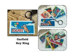 there is a keyring with an image of garfield on it and some other items