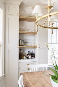 the kitchen is clean and ready to be used as a dining room or office space