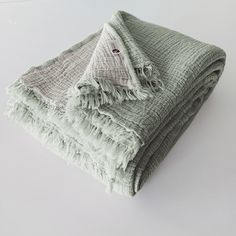 two blankets folded on top of each other