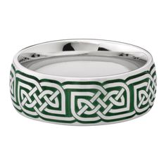 This 8-millimeter Celtic wedding band boasts striking details, layering a refined cobalt band with a laser-engraved Celtic inlay in green Cerakote. A satin finish completes this timeless design, while a domed shape creates a comfortable fit.Cobalt chrome offers the weight of gold and the look of platinum, increased hardness and durability. The bright white metal is a popular choice for its brilliant luster and versatility, ideal for complex wedding band designs. Cerakote finish outperforms conve Celtic Wedding Bands, Celtic Ring, Wedding Band Designs, Helzberg Diamonds, Celtic Wedding, Celtic Rings, Wedding Band Ring, Ceramic Coating, White Metal