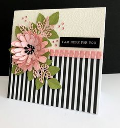 a close up of a card with flowers on it