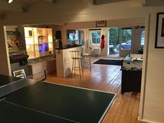 a ping pong table in the middle of a room