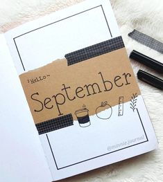 an open notebook with the words hello november written on it