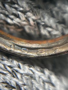 an old metal object that is very close up