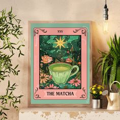 the matcha poster is displayed on a mantle next to potted plants and flowers