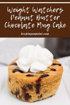 a close up of a dessert on a plate with the words weight watchers peanut butter chocolate mug cake