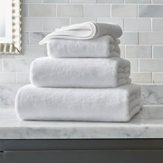 white towels stacked on top of each other