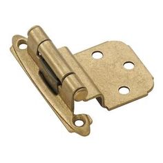 a brass plated door hinge with two holes