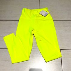 Fluorescent Yellow Leggings. New With Tags. Ultra High Waisted Pureluxe 7/8 Color: Neon Black Camo Leggings, Yellow Leggings, Snakeskin Leggings, Textured Leggings, Lime Yellow, Fabletics Leggings, Fluorescent Yellow, Camo Leggings, Maternity Leggings