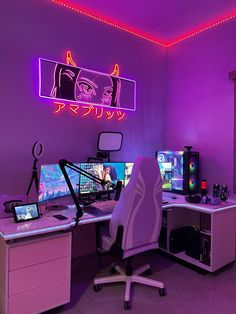 a computer desk with two monitors and a laptop on it in front of a neon purple wall