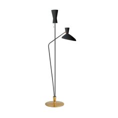 a black and gold floor lamp with two lamps on each side, one light is turned on