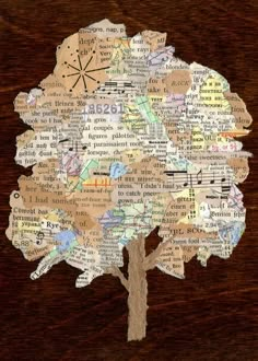 a tree made out of words on a wooden surface