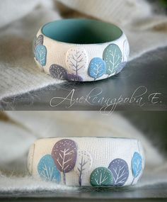 two pictures of the same bracelet with trees on it