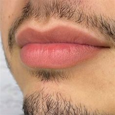 a close up view of a man's lips