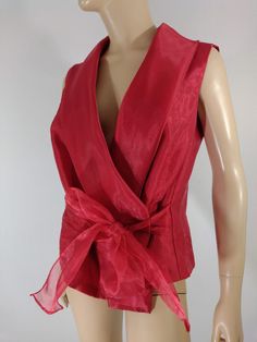 "Womens Red Disco Shimmery Sleeveless Blouse Excellent Condition Vintage by ONYX NITE Size XL 80's 90's Lux GORGEOUS red sleeveless blouse. Shimmery shiny lux fabric in red semi sheer over solid red satiny fabric...huge drama collar and crossover front with large tie, deep V neckline. Super high quality. Really nice piece. Excellent condition. Made in USA vintage. Easy to wear casual chic vintage for the disco sporting life. MEASUREMENTS: Length- 23\" Bust (underarms to underarms)  21\"x 2  Slee Red V-neck Vest For Spring, Formal Sleeveless Vest For Spring, Formal Vest For Spring, Red Sleeveless Formal Tops, Formal Red Sleeveless Top, Red Party Vest Top, Red Sleeveless Party Vest, Spring Evening Vest In Sleeveless Blouse Style, Red Fitted Vest For Summer