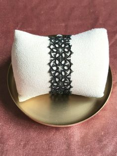 This lace and black pearl cuff bracelet is lightweight, elegant, and very dressy, ideal for going with an evening outfit! The marriage between lace and glass pearls gives it a vintage Victorian style. Made from frivolity lace, handmade in France. Polyester thread, Preciosa Czech glass beads. Magnetic clasp allowing easy one-handed closure, fine gold plated. Contact us for any request for customization of the color of the thread and/or beads, or the type of clasp, we will do our best to satisfy y Elegant Adjustable Beaded Bracelets For Parties, Elegant Adjustable Cuff Bracelet, Elegant Beaded Bangle Bracelets For Party, Elegant Beaded Bangle Bracelet For Party, Elegant Adjustable Pearl Bracelet For Party, Elegant Beaded Lace For Party, Elegant Beaded Lace For Wedding, Elegant Handmade Beaded Bracelets, Elegant Silver Lace For Party