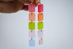 These earrings are made from laser cut acrylic. Iridescent acrylic changes colors depending on the lighting. Small imperfections are normal. Avoid bending or dropping your pieces. Avoid abrasive materials as they may scratch your acrylic. To clean rub gently with a microfiber cloth. These earrings are a part of our Pride collection, a portion of profits from our Pride collection will be donated to various LGBTQIA+ organizations! Acrylic Earrings Laser Cut, Shrinky Dink Earrings, Iridescent Acrylic, Laser Cut Wood Crafts, Pride Collection, Laser Cut Jewelry, Acrylic Jewelry, Laser Cut Earrings, Funky Earrings