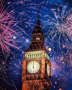 the big ben clock tower is lit up with fireworks