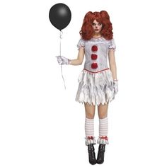 a woman in a clown costume holding a balloon