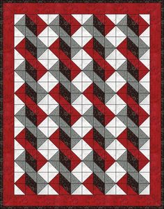 a red and black quilt with white squares on the bottom, and grey triangles at the top