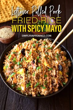 a bowl full of fried rice with chopsticks in it and the words, leftover pulled pork fried rice with spicy mayo