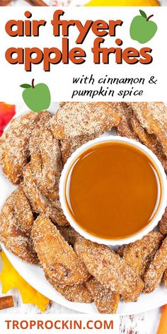 an apple pie with cinnamon and pumpkin spice is served on a white plate, surrounded by apples