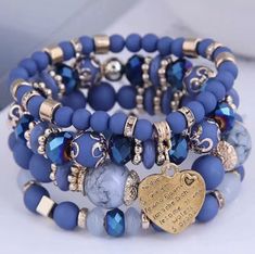 Add a touch of bohemian glamour to your look with this stunning 4pcs/set Boho Strand Bracelets Women Crystal Beads Bracelets Heart Letter BLUE. The bracelets are handmade using high-quality string and stone material, featuring a round shape and multicolor design that will complement any outfit. The traditional charm type and crystal main stone add a touch of elegance, making it perfect for a beach, bohemian, or surfer style. These bracelets are perfect for those who appreciate simple design and vintage style. With wholesale availability, the bracelets are an excellent addition to your jewelry collection. Get your hands on this beautiful beach and bohemian theme bracelet today! Bohemian Glamour, Bracelets Heart, Blue Bracelets, Beach Bohemian, Bracelets Women, Bohemian Theme, Heart Letter, Blue Beaded Bracelets, Surfer Style