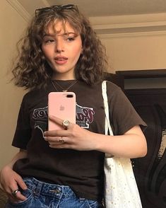 Curtain Bangs For Curly Hair Short, Curly Straight Across Bangs, Short Perm With Bangs, Curly Hair Curtain Bangs Short, Bangs On Short Curly Hair, Frizzy Curtain Bangs, Short Hair Bangs Curly, Short Wavy Hair With Wispy Bangs, Short Curly Brown Hair Aesthetic