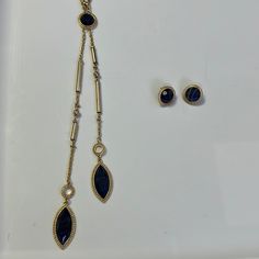 Draper’s & Damon’s Unstamped And Unsigned Gold Tone Vintage Dark Blue (Almost Black - But They Are Blue) Gemstone With Brown Veining Long Necklace And Earrings -Necklace- Lobster Clasp Decoration (Pipes/Cylinders, Disco Balls, Filigree Disc) Still On Original Packaging Approx. 23 Inches In Length (No Extender) -Earrings- Pierced Ear Round Disk Back Closures 3/4 Inch Diameter Comes From Smoke Free, Pet Friendly House. Photos Are Part Of The Description. Pet Friendly House, Pierced Ear, Lapis Necklace, House Photos, Cubic Zirconia Bracelet, Crystal Choker Necklace, Hematite Bracelet, Disco Balls, Ear Cuff Earings