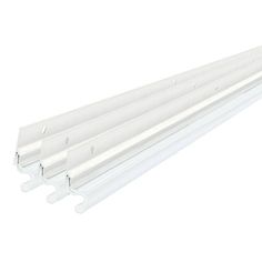 three white plastic gutter rails on a white background with clippings for each section