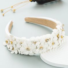 - Applique design - Rhinestone embellished - Length: 6.2 inch, Width: 4.9 inch - Material: 100% Polyester, 100% Zircon Retro Headband, Floral Headband, Floral Hoops, White Headband, Crown Headband, Leather Flowers, Hair Hoops, Floral Headbands, White Rhinestone