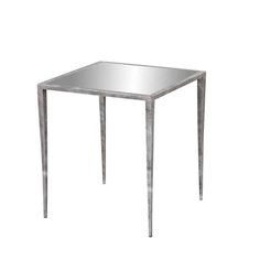 a metal table with a mirrored top and legs on the bottom, against a white background