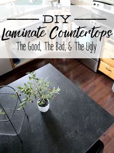 a black table with a potted plant on it and the words diy laminate countertops