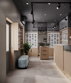 the inside of a store with lots of eyeglasses on display and a bench