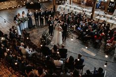 an overhead view of a wedding ceremony with the bride and groom standing at the alter