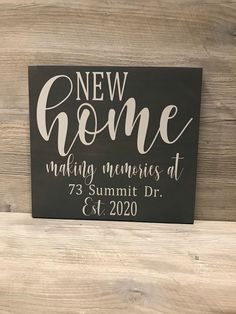 a black and white sign that says new home making memories at 733 summit dr