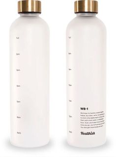 two white bottles with gold caps on each one are shown side by side, the other is empty