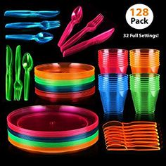 neon colored plastic plates, forks and spoons are shown in this image with glow colors